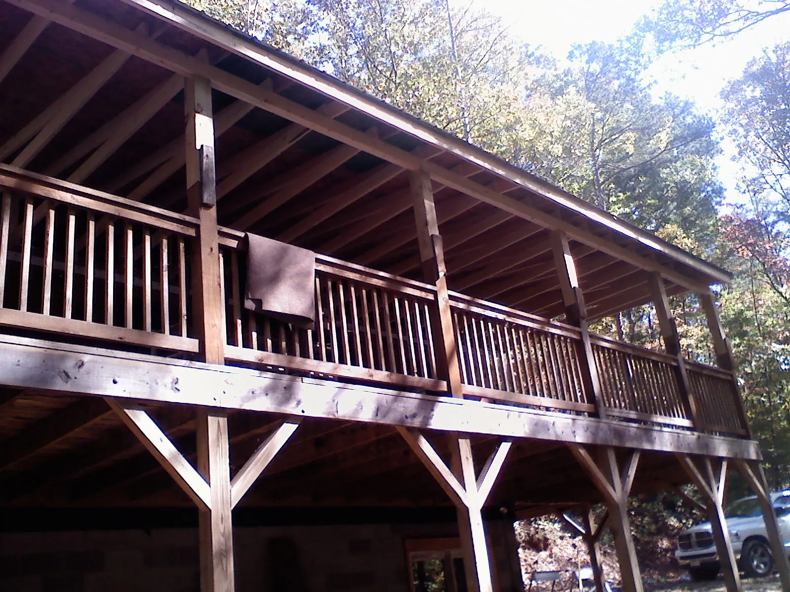 Timber framing under a new elevated porch and deck — Roof Leak Repair in Fennville by Roofing Brothers